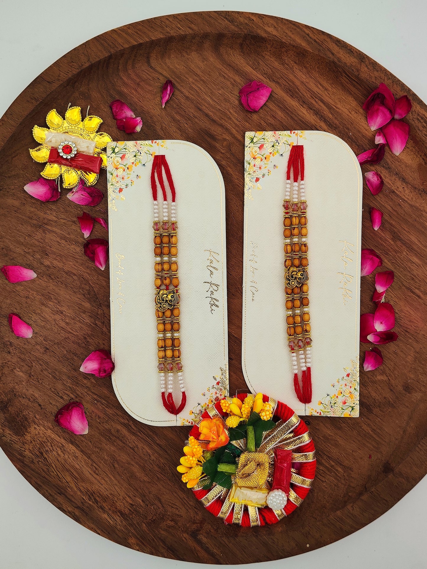 Ganesh Rudraksha Rakhi with Red Tassel | Floral Gift Card