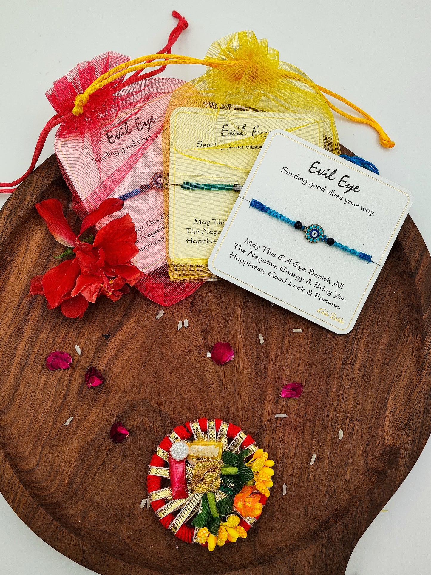 Om & Evil Eye Rakhi with Organza Pouch