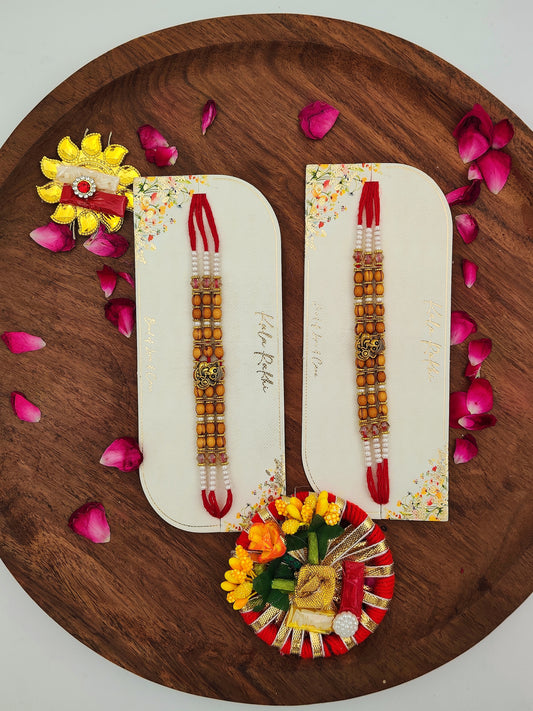 Ganesh Rudraksha Rakhi with Red Tassel | Floral Gift Card